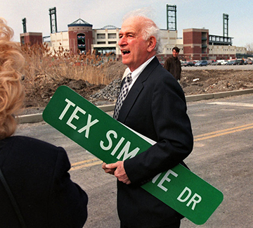 Tex Simone with Street Sign